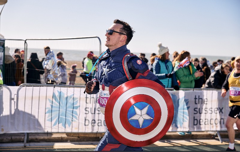Man running as Captain America