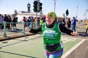 Woman running for Macmillan